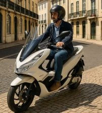 Can I ride a motorcycle with a car license in Portugal?